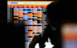 Sensex trades flat during early session