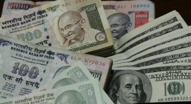 Rupee at near 1-week high, adds 13 paise to 61.46 vs dollar