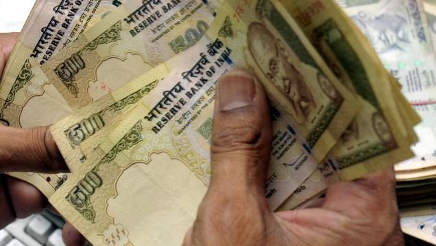 Indian rupee trims initial losses vs dollar, still down 5 paise