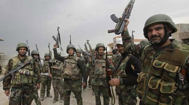 Syrian troops regain town from rebels