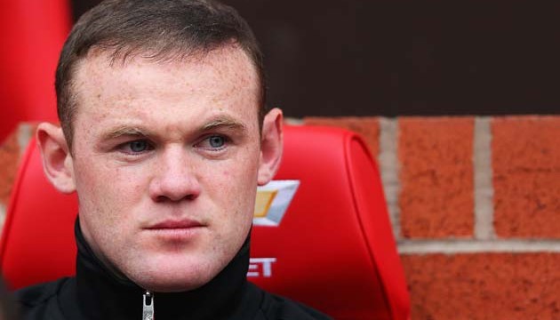 Rooney was told to leave massage parlour to `save career` after phone was hacked