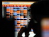 Sensex trades flat in pre-noon session